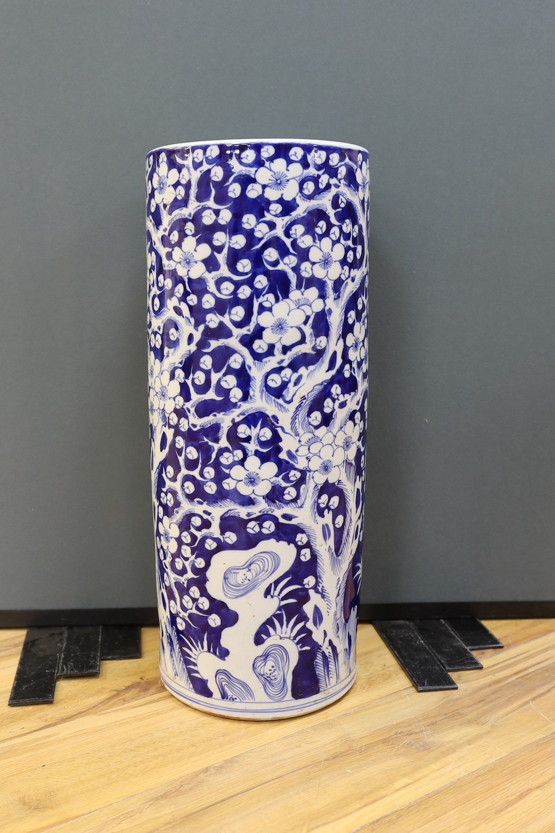 A 19th century Chinese porcelain blue and white stick stand - 62cm high